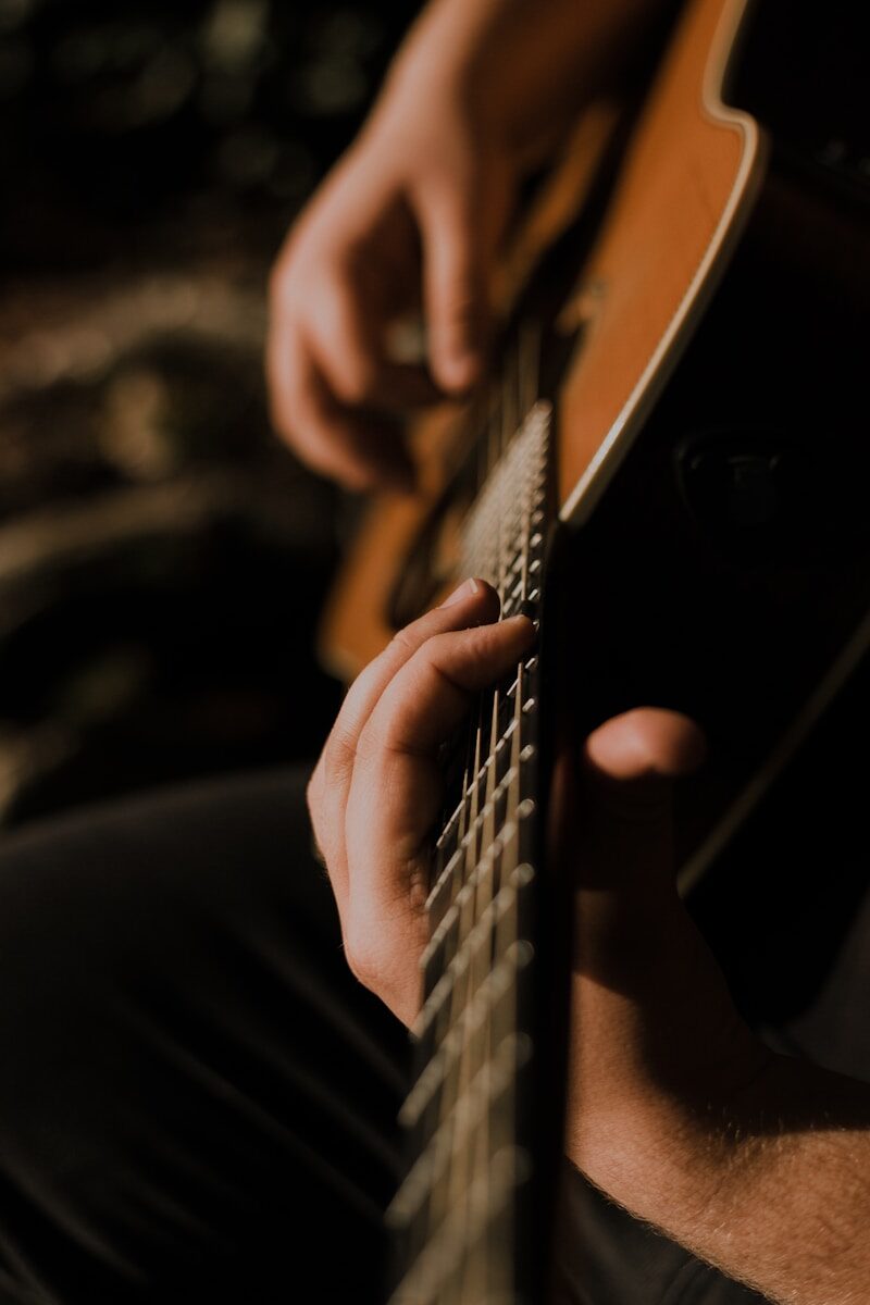 Hogg Sessions performer with guitar